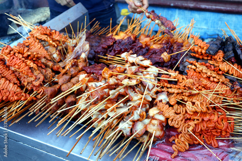 Assorted chicken and pork innards sold at a street food stall photo