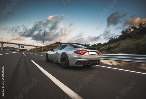 Silver sport coupe with red lights on the highway © azerbaijan-stockers