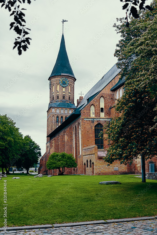 View of the Brick Gothicstyle Konigsberg Cathedral in Kaliningrad. Russia, Kaliningrad, 2019-05-27.