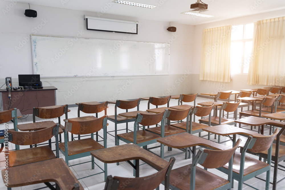 Schools in Asian shutdown due to spreading of the Crononaviru or COVID-19. An empty classroom with no student. Schools in Asian shutdown due to spreading of the Crononaviru or COVID-19. An empty classroom with no student.