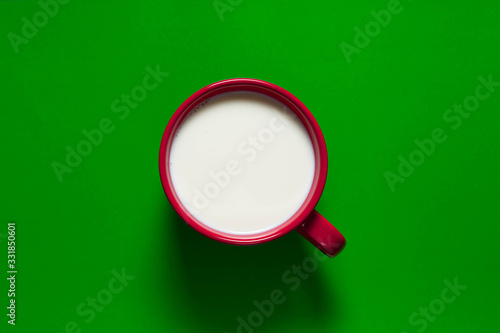 big mash with milk on a colored background