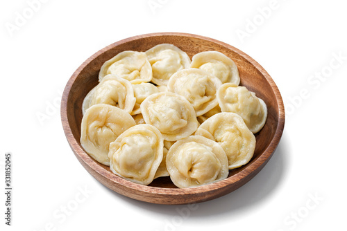 Homemade meat dumplings - russian pelmeni. Dumplings, filled with meat, ravioli. isolated on white background