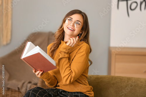 Young woman with stylish ey...