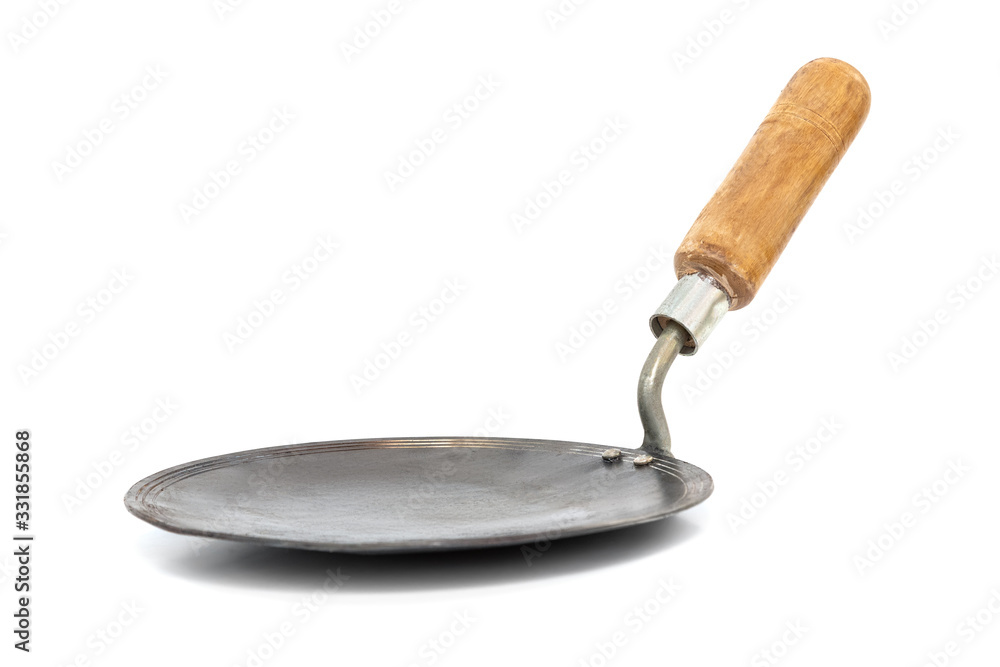 Indian iron tawa or pan to prepare chapati, roti on white background