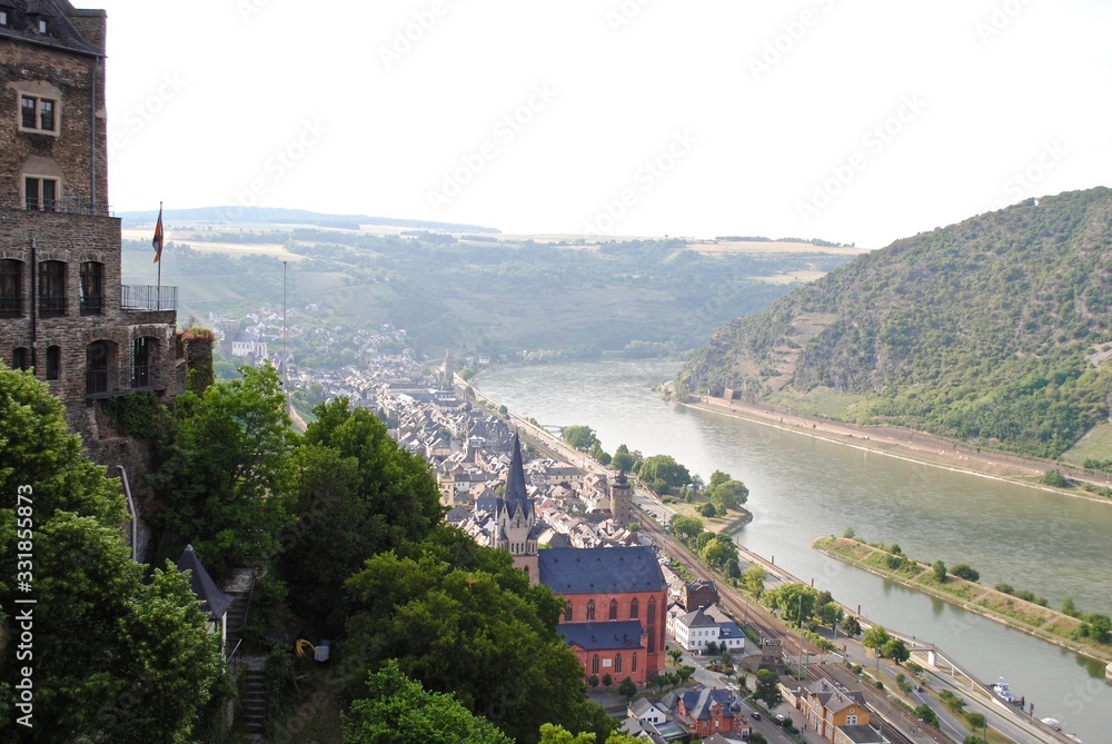 Hazy sunset view from Schönburg (Auf Schoenburg), a castle above the medieval town of Oberwesel in the UNESCO World Heritage site of the Upper Middle Rhine Valley, Rhineland-Palatinate, Germany. 