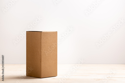 cardboard box on wooden table