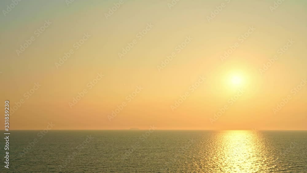 Time-lapse of a dramatic golden sunset over the waves of the bay of Thailand. Time-lapse of a dramatic golden sunset over the waves of the bay of Thailand.
