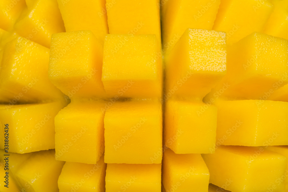 Diced mango chunks. Tropical fruits. Healthy diet food. Flat lay Close up Diced mango chunks. Tropical fruits. Healthy diet food. Flat lay Close up