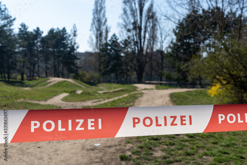 Police line closing access to parks and gardens during the coronavirus quarantine in Austria, Europe, March, 2020