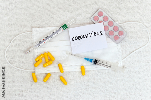 Abstract virus strain model of MERS-Cov or middle East respiratory syndrome coronavirus and Novel coronavirus 2019-nCoV with text on white (medical gauze) background.