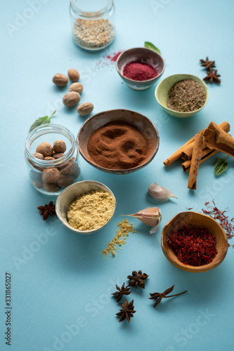 Spices collection on blue surface