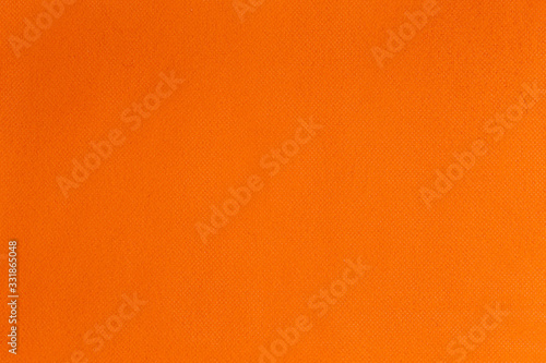 The texture of the Fabric spunbond. Orange texture background