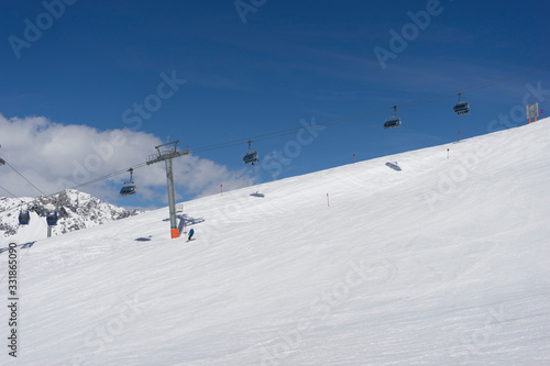 Ski slope at sunny day