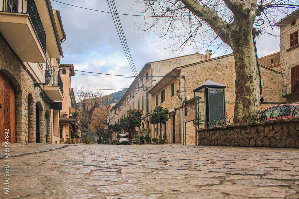 empty street with cobble stones in Valldemossa, Mallorca, Spain