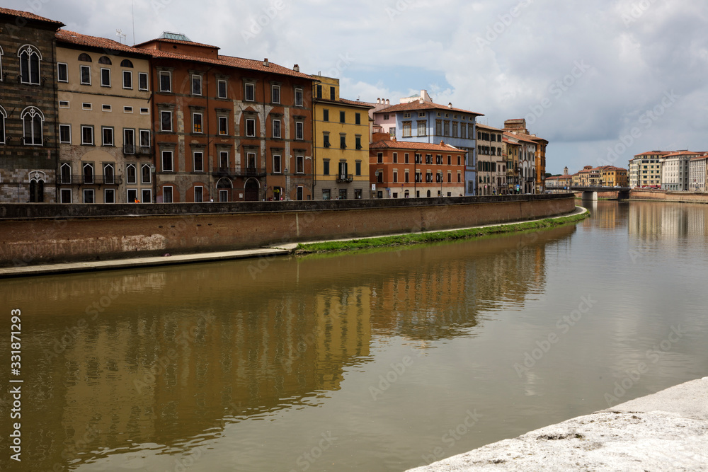 Pisa (PI), Italy - June 10, 2017: View of Arno river, Pisa, Tuscany, Italy, Europe