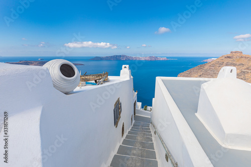 Romantic summer vacation and honeymoon destination. White architecture on Santorini island, Greece. Beautiful summer landscape, sea view.