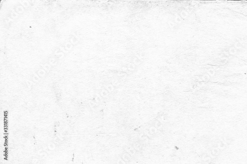 Cardboard white texture close-up. Light old paper background. Grunge concrete wall. Vintage blank wallpaper.