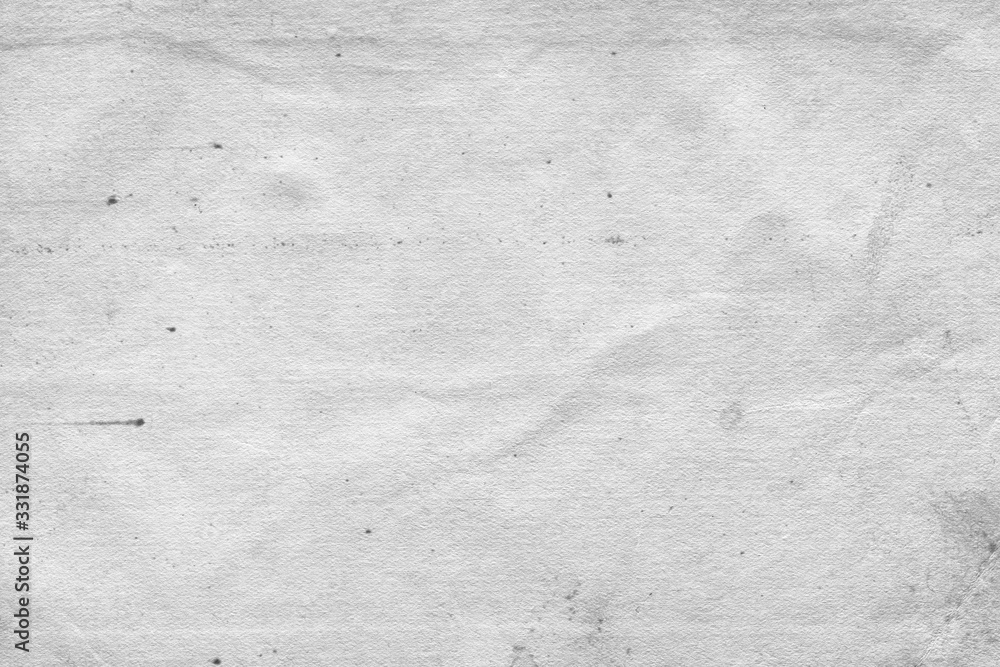 Fototapeta premium Cardboard white texture close-up. Light old paper background. Grunge concrete wall. Vintage blank wallpaper.