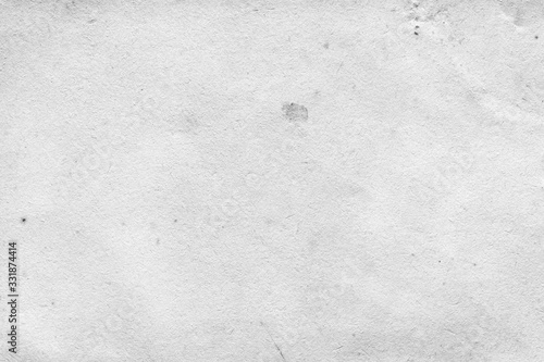 Cardboard white texture close-up. Light old paper background. Grunge concrete wall. Vintage blank wallpaper.