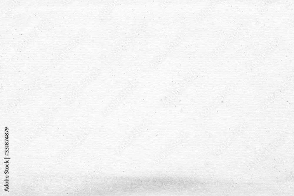 Fototapeta premium Cardboard white texture close-up. Light old paper background. Grunge concrete wall. Vintage blank wallpaper.