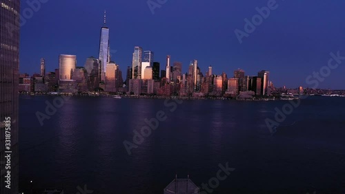 4K Aerial Footage, Aerial view of New York city Manhattan skyline from Jersey at dusk.	