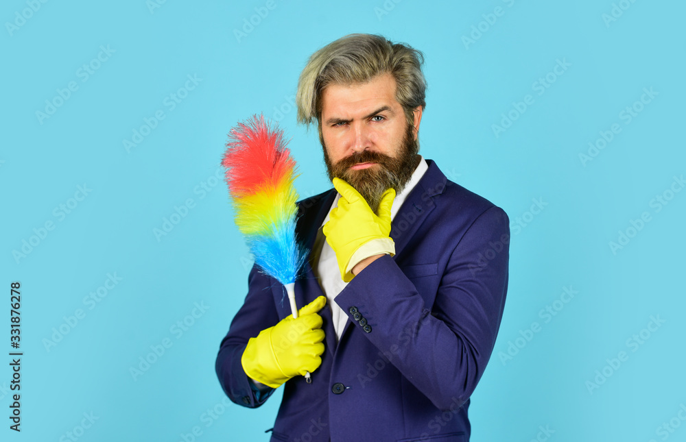Clear reputation. Hipster hold cleaning tool. Cleaning concept. Office duster. Man use pp duster. Dust allergy. Businessman cleaning office. Cleaning service. Housekeeping duties. Cleaning apartment Clear reputation. Hipster hold cleaning tool. Cleaning concept. Office duster. Man use pp duster. Dust allergy. Businessman cleaning office. Cleaning service. Housekeeping duties. Cleaning apartment