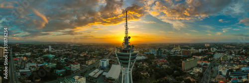 Alor Setar tower during sunrise. The Alor Setar Tower is 166 m tall and is the main telecommunications tower in the Malaysian state of Kedah photo