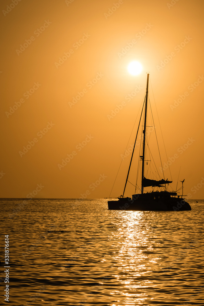 Seascape, silhouette of a yacht