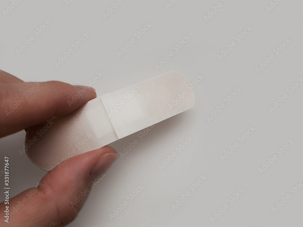 patch in hand on a white background. patch in hand on a white background.