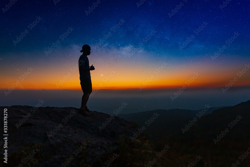 Landscape with Milky Way. Night sky with stars and silhouette of a standing happy man on the mountain,Outer Space, Star - Space, Milky Way, Night, Mountain Climbing