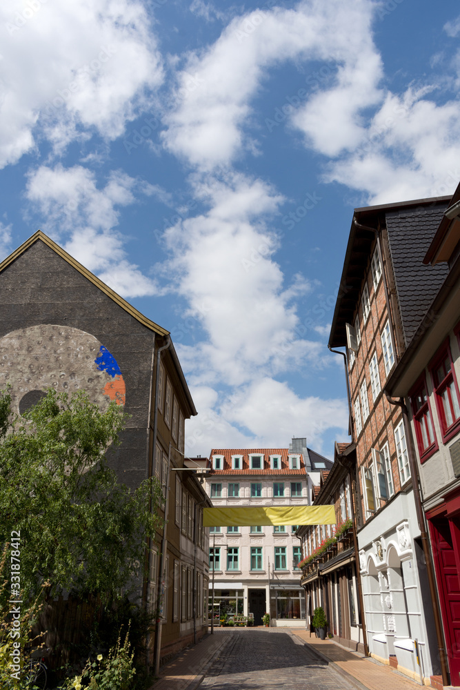 Naklejka premium Historic Alley at the Historic City Centre of Schwerin, Mecklenburg-West Pomerania, Germany
