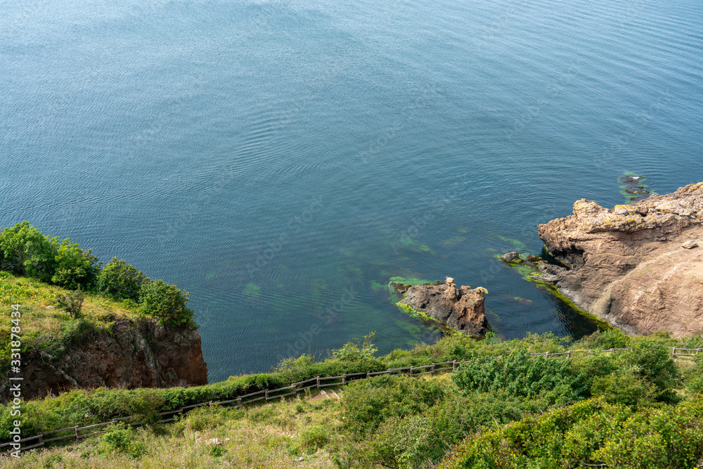 Hammershus, Bornholm / Denmark - July 29 2019: View from above of a bay in Bornhol, denmark. Hammershus, Bornholm / Denmark - July 29 2019: View from above of a bay in Bornhol, denmark.