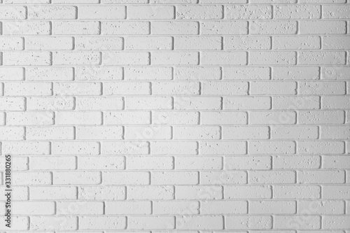 Fototapeta White brick wall background. Horizontal white textured wallpaper