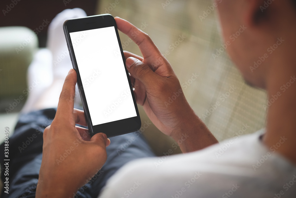 Cropped shot view of man hands holding smart phone with blank copy space screen for your text message or information content, female reading text message on cell telephone during in urban setting. Cropped shot view of man hands holding smart phone with blank copy space screen for your text message or information content, female reading text message on cell telephone during in urban setting.