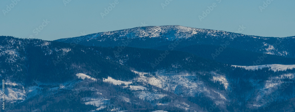 Pilsko from Barania Gora hill in winter Beskid Slaski mountains in Poland