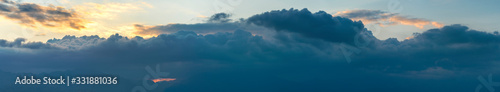 Panorama of colorful clouds at dawn