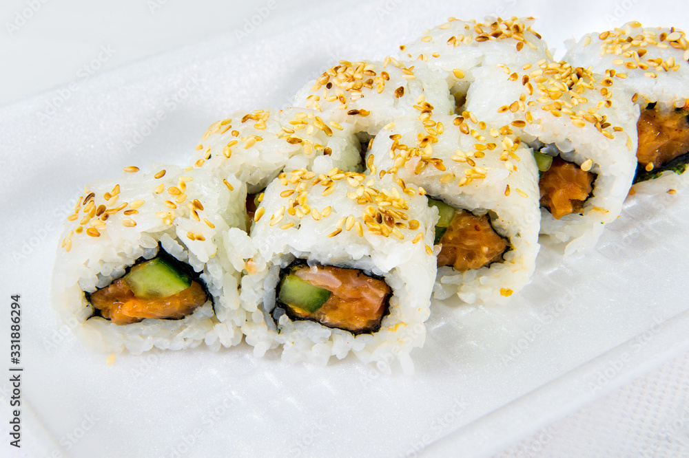 Japanese rolls with fish and cucumber Japanese rolls with fish and cucumber