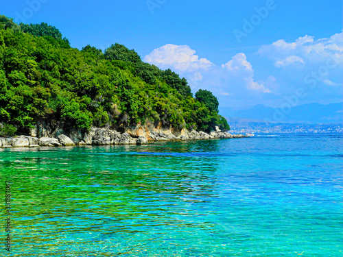 Beautiful beach, turquoise water, trees and sunny sky. Vacations concept.