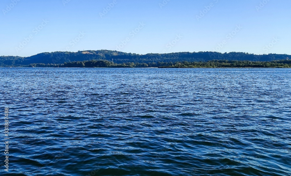 Stunning Columbia River and the deep blue water as it ripples in the afternoon in Camas Washington
