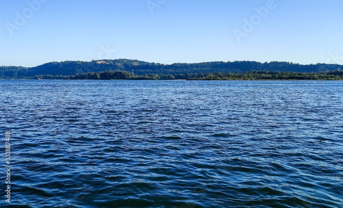 Stunning Columbia River and the deep blue water as it ripples in the afternoon in Camas Washington