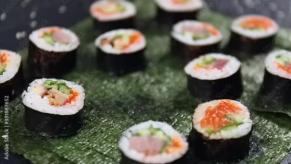 Tasty sushi rolls on table Tasty sushi rolls on table