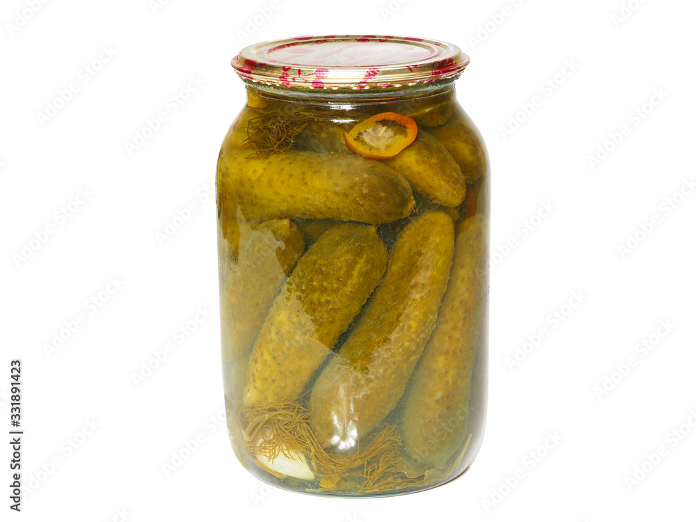 Glass jar with homemade canned pickled cucumbers on a white background Glass jar with homemade canned pickled cucumbers on a white background