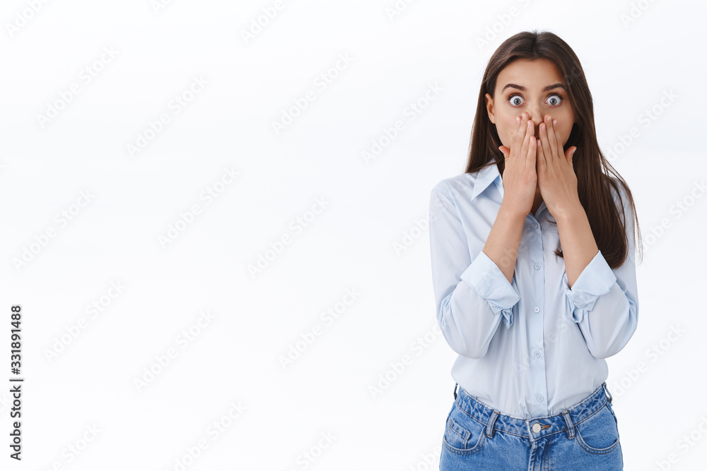 Oh gosh tell me more. Astonished and speechless young girl gossiping with coallegue about boss affair, gasping shocked and cover mouth with hands express surprise with eyes, white background Oh gosh tell me more. Astonished and speechless young girl gossiping with coallegue about boss affair, gasping shocked and cover mouth with hands express surprise with eyes, white background