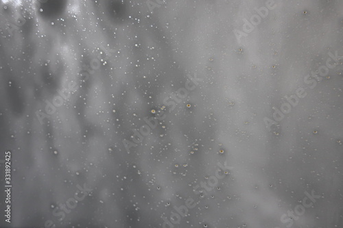  white background of soapy foam with water droplets