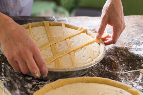 Photos Preparation of Easter cake, also called Pastiera Napoli, typical homemade desser
