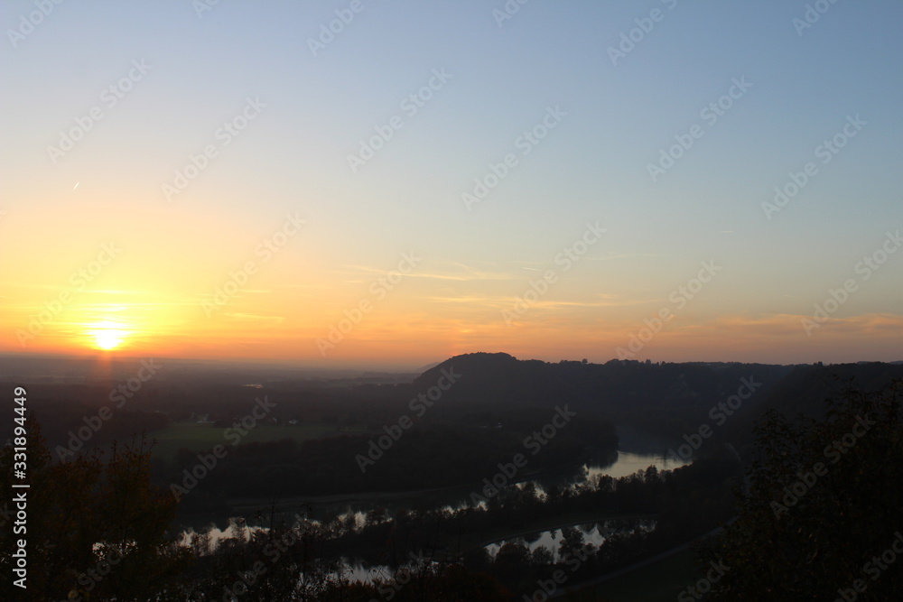 foggy sunset over river