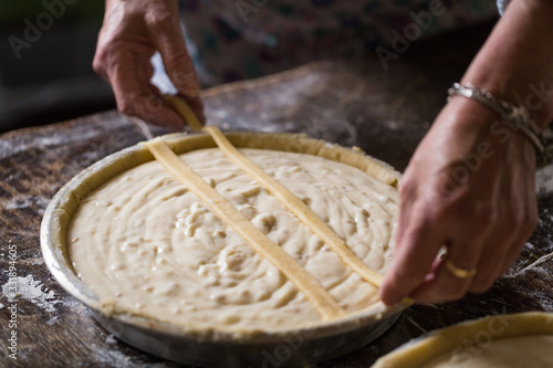 Tableau sur toile Preparation of Easter cake, also called Pastiera Napoli, typical homemade desser