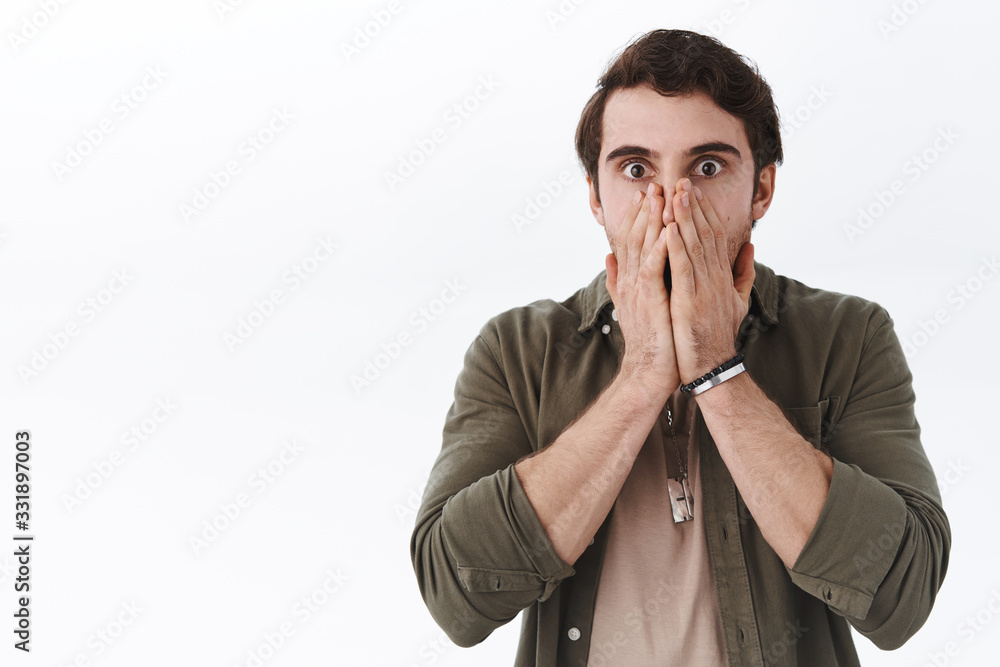 Shocked worried man looking someone collapsed, staring startled heard bad astonishing news, gasp and cover mouth with palms, looking popped eyes camera, cant believe own eyes Shocked worried man looking someone collapsed, staring startled heard bad astonishing news, gasp and cover mouth with palms, looking popped eyes camera, cant believe own eyes