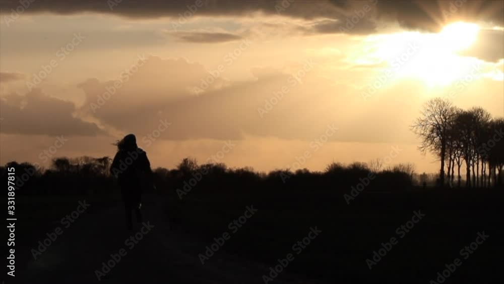 Running in the rain with the apocalyptic sunset Running in the rain with the apocalyptic sunset