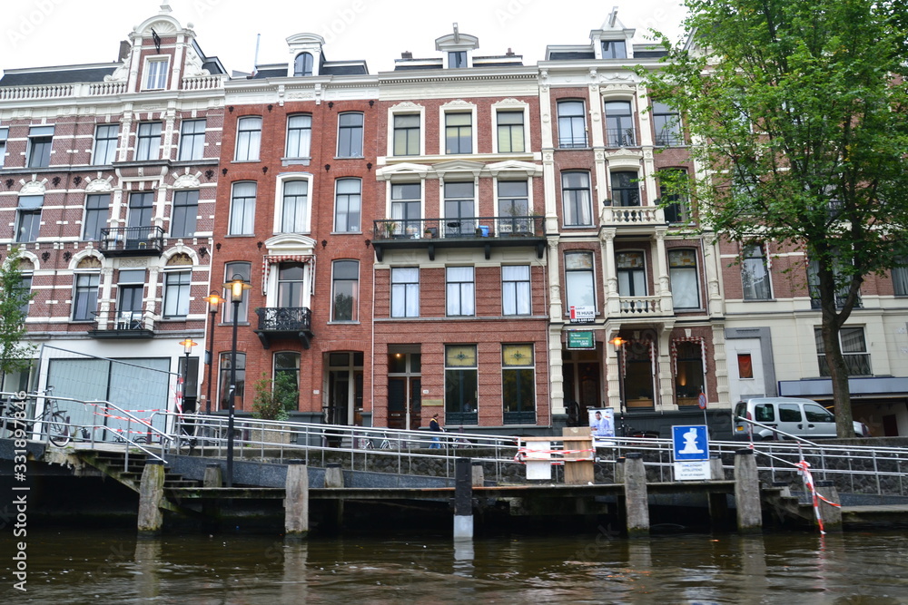 River in Amsterdam, city on the river, houses